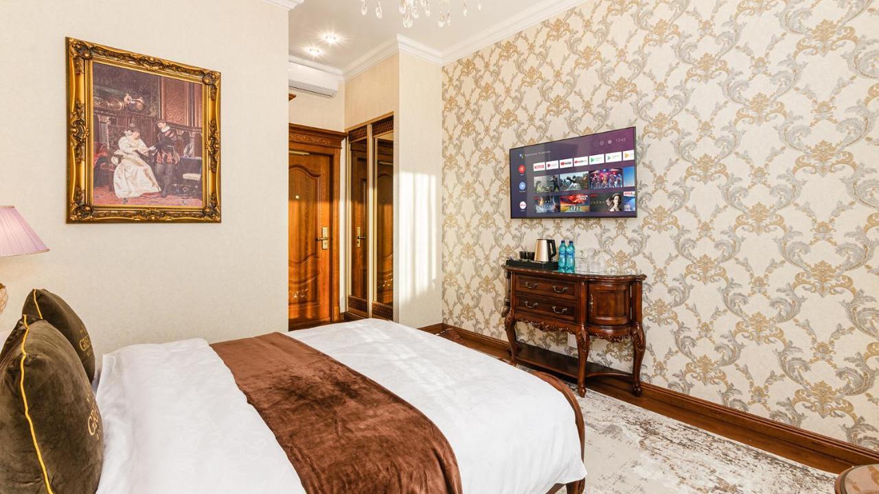 Gregory Boutique Hotel Chisináu Exterior foto A room at the hotel